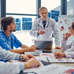 Group,Of,Doctors,Working,Together,In,Clinic.,Medical,Personnel,In