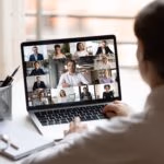 View,Over,Businesslady,Shoulder,Seated,At,Workplace,Desk,Look,At