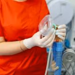 Breathing,Anaesthesiology,Face,Mask,Held,In,Hands,In,Latex,Transparent