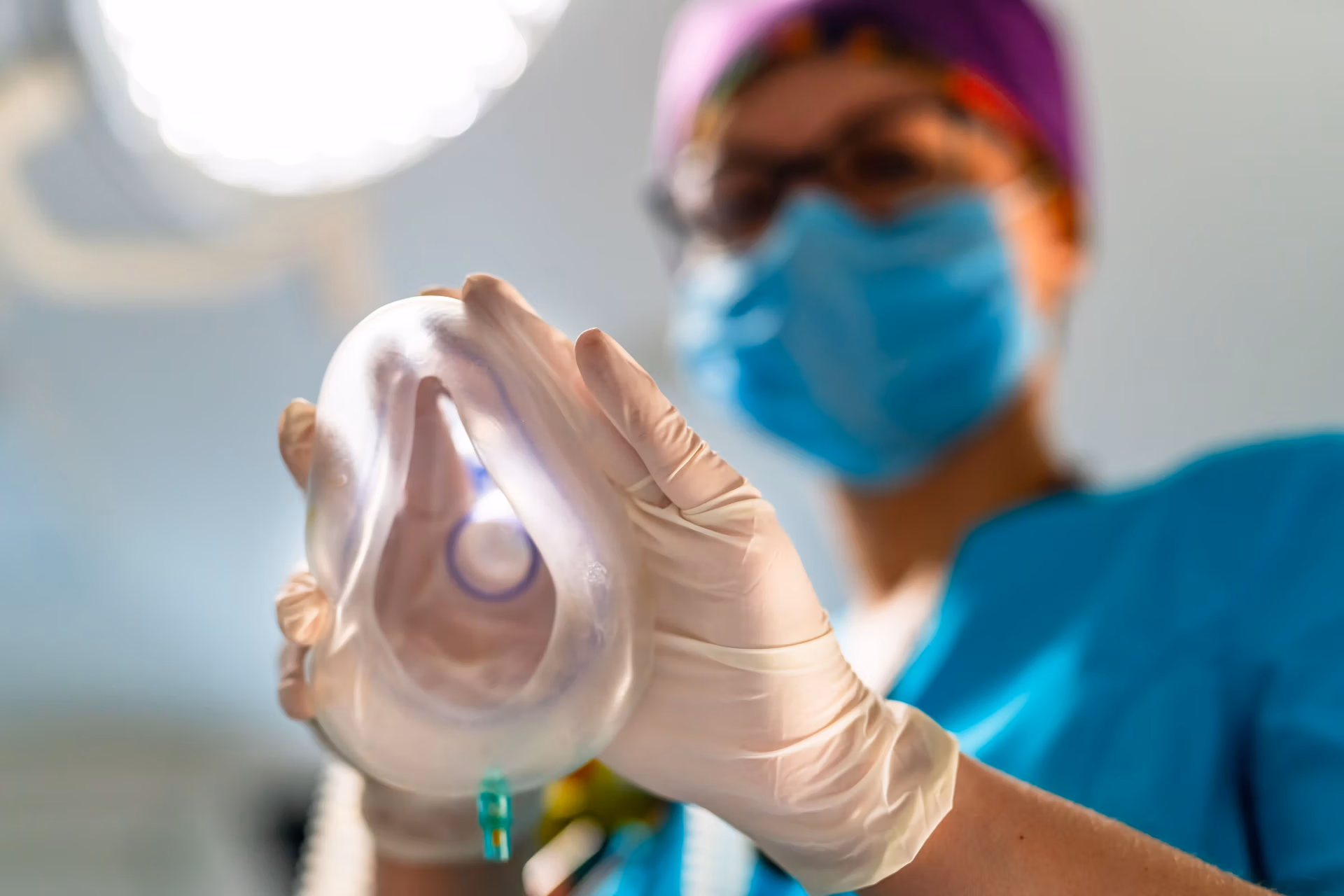 Oxygen,Mask,From,The,Eyes,Of,A,Patient.,Female,Anesthesiologist