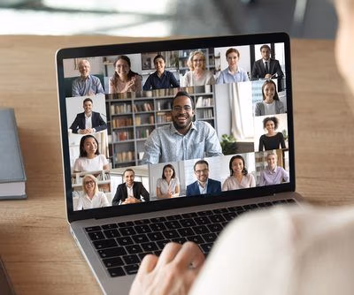 Back,View,Of,Female,Employee,Speak,Talk,On,Video,Call Back,View,Of,Female,Employee,Speak,Talk,On,Video,Call