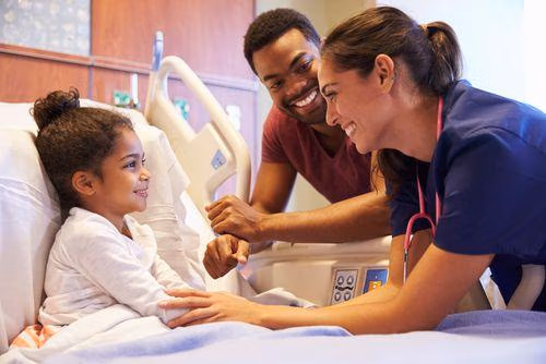 Pediatrician,Visiting,Father,And,Child,In,Hospital,Bed Pediatrician,Visiting,Father,And,Child,In,Hospital,Bed