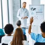 Portrait,Of,A,Young,Doctor,Teaching,On,A,Seminar,In