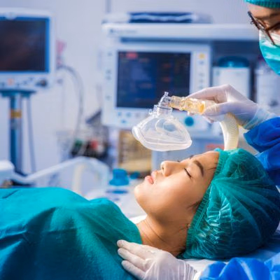 Patient,With,Mask,Ventilation,In,Operation,Room,And,Surgery,Team