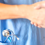 Doctor,Surgeon,Handshaking,With,Physician,Team,Or,Patient,As,Ensure