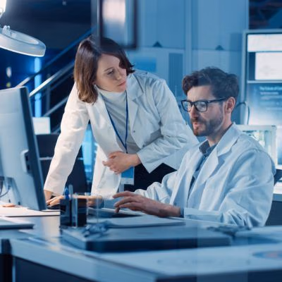 Machine,Engine,Development,Engineer,Working,On,Computer,At,His,Desk, Machine,Engine,Development,Engineer,Working,On,Computer,At,His,Desk,