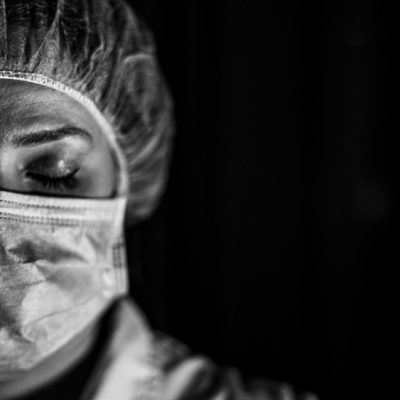Portrait,Black,And,White,Of,Young,Female,Surgeon,,Wearing,Mask