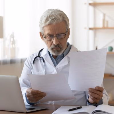 Serious,Professional,Senior,Elderly,Doctor,Doing,Paperwork,Checking,Medical,Documents Serious,Professional,Senior,Elderly,Doctor,Doing,Paperwork,Checking,Medical,Documents