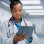 Medical,Hospital,Portrait:,Confident,African,American,Female,Medical,Doctor,Using