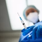 Needle,In,Hand,,Medicine,And,Doctor,Person,,Healthcare,And,Low