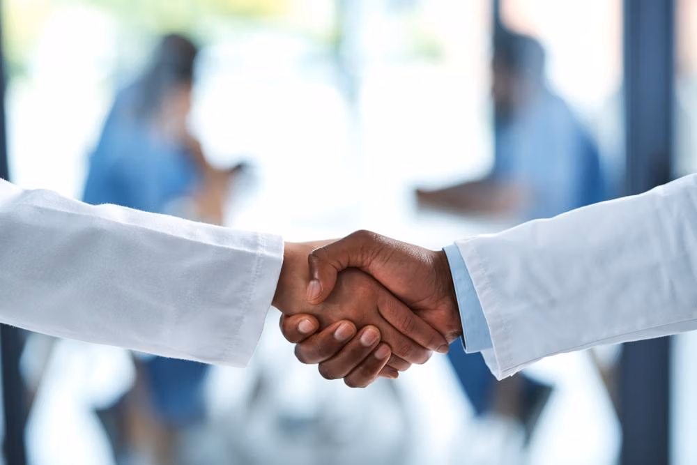 People,,Medical,And,Doctor,Handshake,In,Hospital,,Medicine,And,Wellness