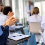 Group,Of,Doctors,On,Conference,,Medical,Team,Clapping,After,Speech.