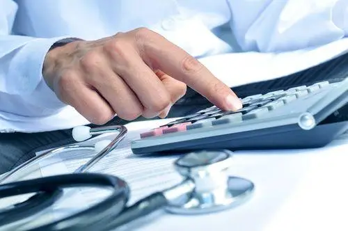 Closeup,Of,A,Young,Caucasian,Healthcare,Professional,Wearing,A,White Closeup,Of,A,Young,Caucasian,Healthcare,Professional,Wearing,A,White